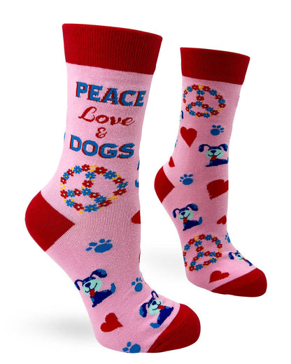 Pink socks with peace signs, hearts, and dog illustrations on a white background
